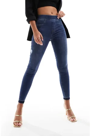 Spanx Shape and lift distressed skinny jeans in blue