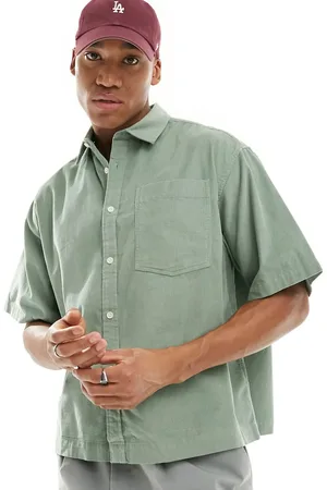 ASOS Boxy oversized cropped shirt in cord in light green