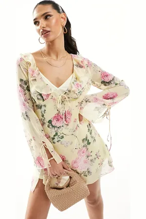 Love Triangle Mini dress with ruffle detail in yellow floral