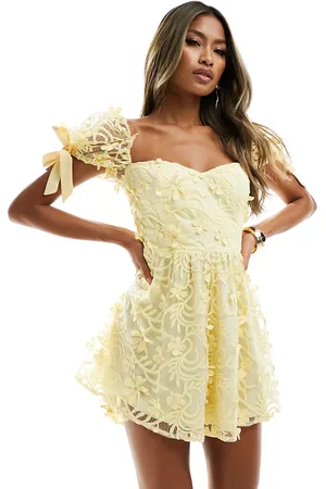 Love Triangle Lace playsuit with tie back in yellow