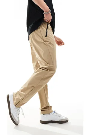 Lacoste Chinos in -Neutral