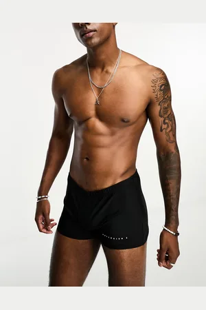 COLLUSION Swim brief shorts in