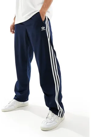 adidas Firebird track pants in navy