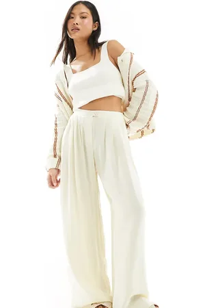 Stradivarius Petite fluid pleat front pants in buttermilk