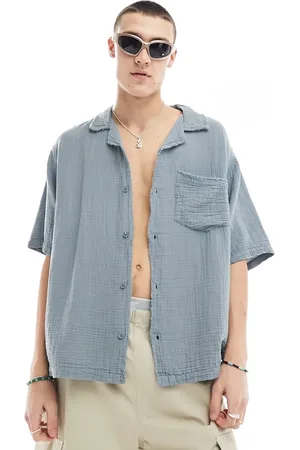 COLLUSION Textured oversized revere short sleeve shirt with raw seam detail in
