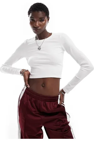 Monki Long sleeve ribbed shrunken top in