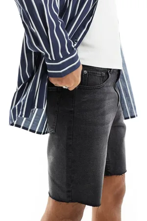 ADPT. Wide fit cut off denim shorts in washed black