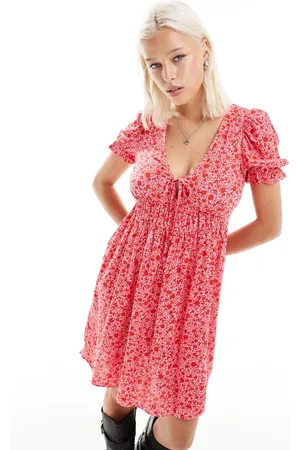 Monki Mini smock dress with puff sleeves in pink ditsy floral print