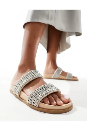 Schuh Tessie embellished slides in neutral