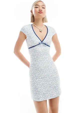 Glamorous V neck short sleeve mini dress in vintage blue ditsy and velvet ribbon trim-Green