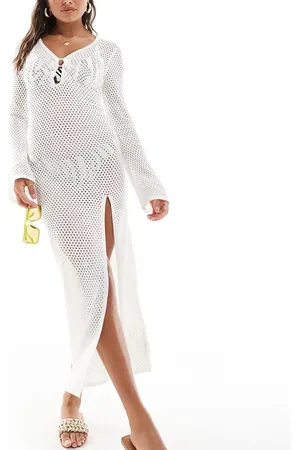 In The Style Exclusive crochet ring detail flared sleeve maxi beach dress in -Neutral