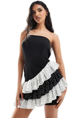In The Style Exclusive bandeau dress with contrast asymmetric polka dot trim in black