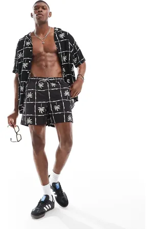JACK & JONES Palm grid print swim shorts in (part of a set)
