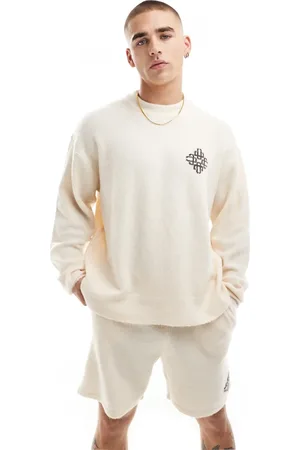 The Couture Club Emblem knitted crew sweatshirt in off (part of a set)