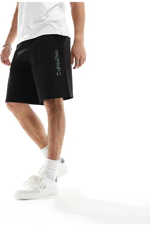 Calvin Klein Shadow embossed logo jersey shorts in black