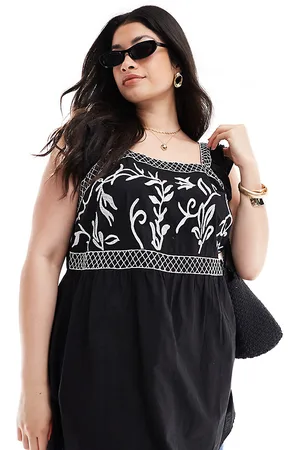 Yours Embroidery peplum top in black and white