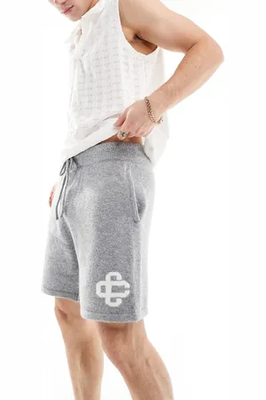 The Couture Club Emblem knitted shorts in