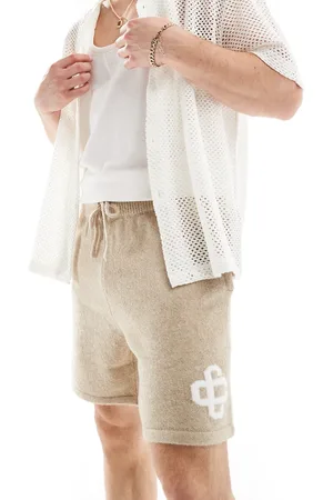 The Couture Club Emblem knitted shorts in -Neutral