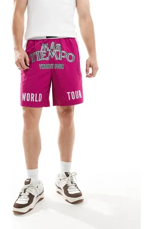 PUMA MAS TIEMPO football shorts in magenta
