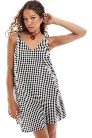 Monki Seersucker bow tie strap mini dress with side pockets in gingham-Multi
