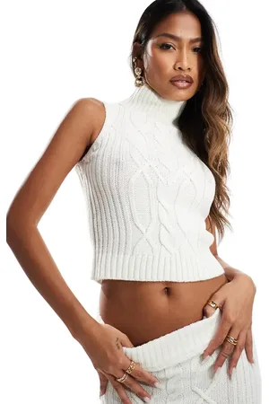 In The Style Sleeveless cable knit roll neck jumper in (part of a set)-Brown