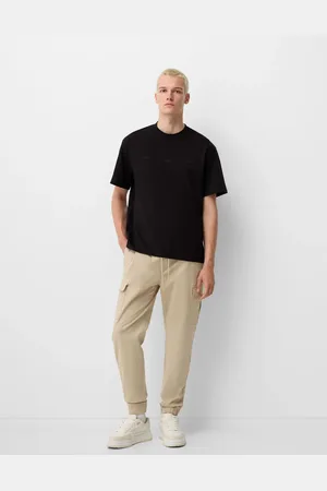 Bershka Cargo pants in -Neutral