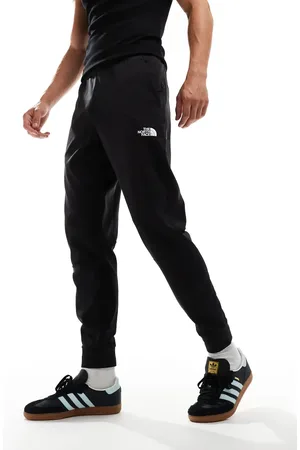The North Face Mountain Athletics logo trackies in black