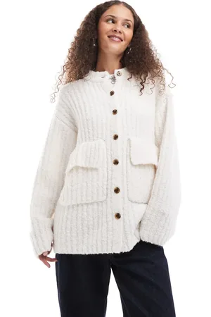Monki Chunky knit rib high neck cardigan with button front and front flap pockets in