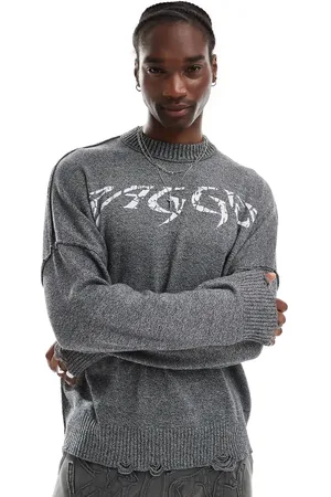 The Ragged Priest Distressed oversized knit jumper with print logo in black acid wash