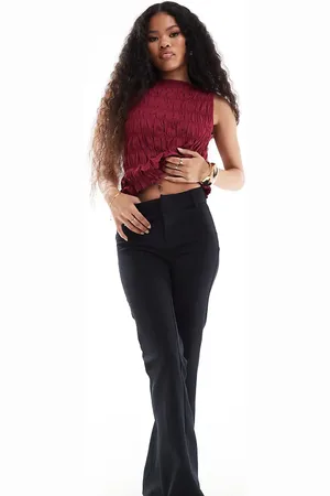 Bershka Petite flared tailored pants in