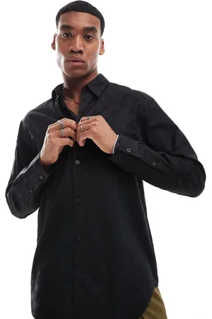 Armani Exchange All over logo printed long sleeve shirt with satin shine effect in