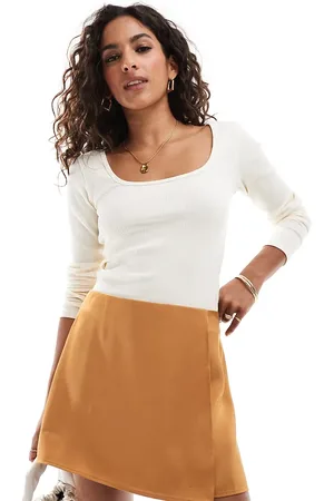 ASOS ASOS DESIGN Petite wrap satin skirt in gold-Yellow