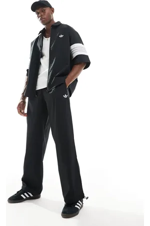 adidas Basketball woven pants in