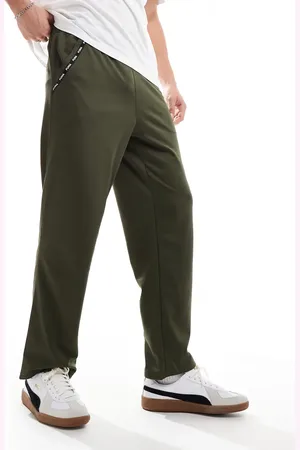 PUMA Taped PWRFleece Lite trackies in olive-Green