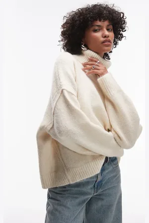 Topshop Knitted exposed seam roll neck relaxed jumper in -White