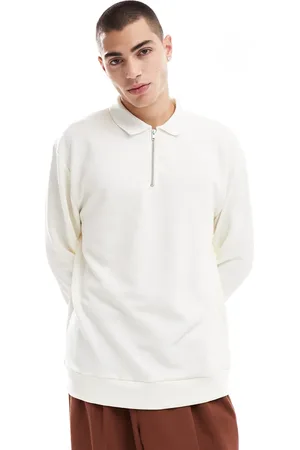 ASOS Long sleeved relaxed polo shirt with quarter zip in cream-White
