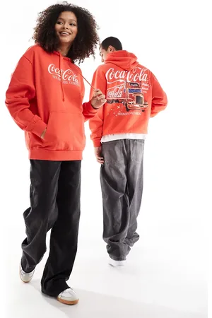 ASOS Christmas unisex oversized hoodie with Coca-Cola festive prints in