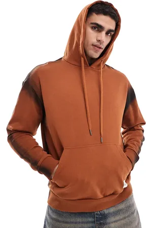 Native Youth Spray dye oversized hoodie in rust-Brown