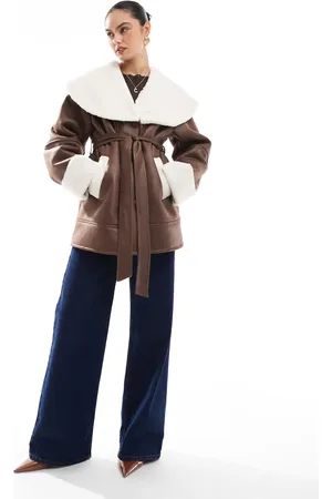 The Frolic X Bella Stovey exclusive faux shearling and cream borg contrast belted coat in brown