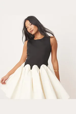 Never Fully Dressed Petite contrast drop hem mini dress in -Black