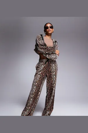 Juicy Couture Velour wide leg trackies in print exclusive to ASOS-Brown