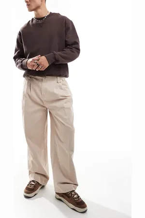 The Ragged Priest Wide fit twill pleat chinos in -Neutral