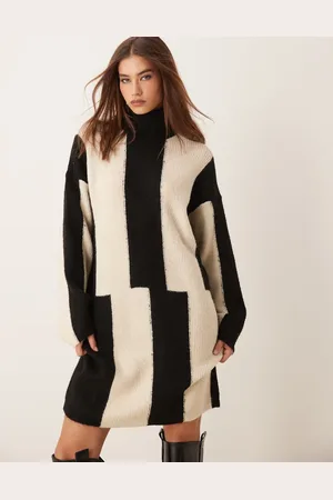 VILA Knitted high neck mini dress in abstract print-Black