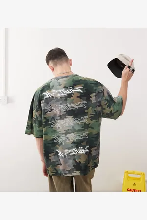 COLLUSION Relaxed graffiti graphic t-shirt in camo print