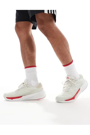 adidas Adidas Running Supernova Stride 2 trainers in white and red