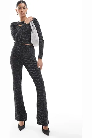 VERO MODA Flared pants in black and silver glitter (part of a set)
