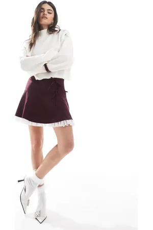 Miss Selfridge Flippy mini skirt with bows in -Red