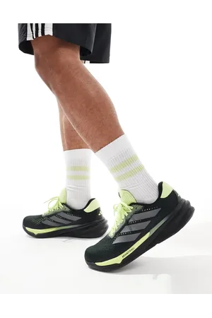 adidas Adidas Running Supernova Stride 2 trainers in and lime