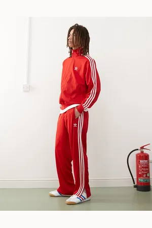adidas Firebird track pants in red