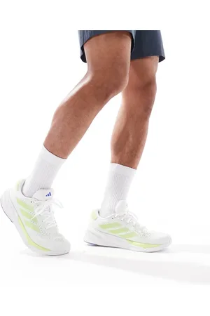 adidas Adidas Running Supernova Stride 2 trainers in and lime